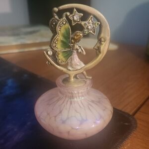 Empty Fairy perfume bottle.